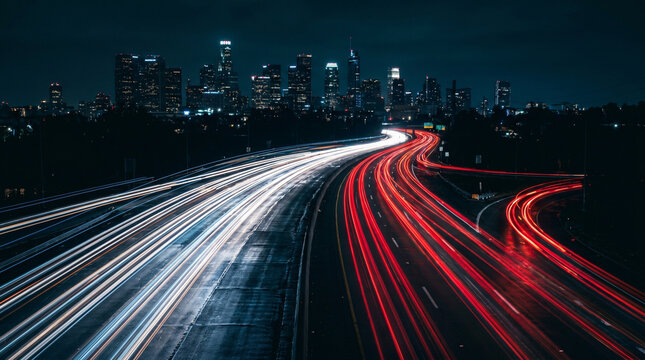 Night Highway Light Trails with City Skyline