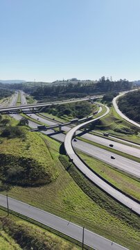 Aerial Drone Shot of a Traffic Flow on a City Ring Road at Daytime