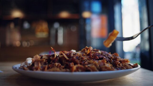 Enjoyed A Tasty Plate Of Sliced Eastern Meat And Fries At An Eastern Restaurant From First Person View