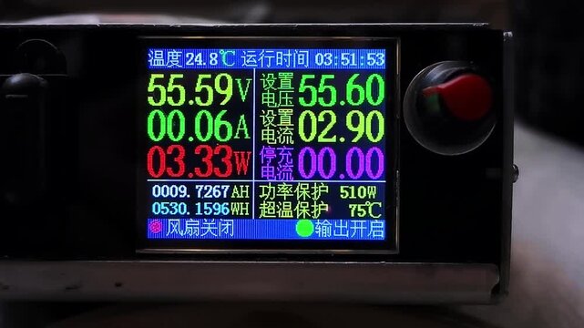 Electronic device display showing voltage and amperage readings