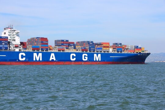 SAN FRANCISCO, USA - APRIL 8, 2014: CMA CGM Centaurius container ship sails in San Francisco bay. CMA CGM is the one of largest container shipping companies in the world.