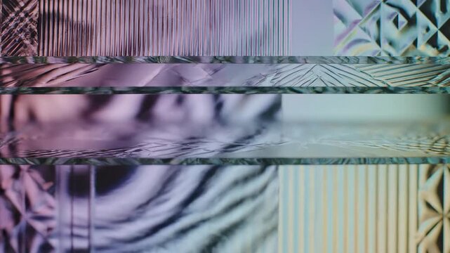 Close up view of layered glass with various patterns and light reflections in a bright space
