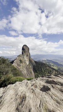 Pedra do Ba&uacute; in S&atilde;o Bento do Sapuca&iacute; in vertical video. Rock climbing site. Atlantic Forrest.