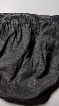 close-up of unused underwear featuring smooth textile material and clean craftsmanship. Suitable for fashion catalogs, online shopping, clothing advertisements, garment production, and hygiene-related