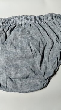 close-up of unused underwear featuring smooth textile material and clean craftsmanship. Suitable for fashion catalogs, online shopping, clothing advertisements, garment production, and hygiene-related