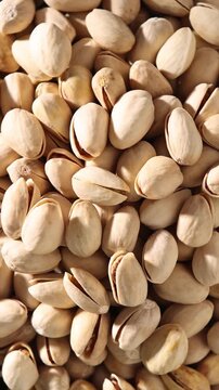 Raw Pistachios Rotating, Close-up 360 Spin, Seamless Loop