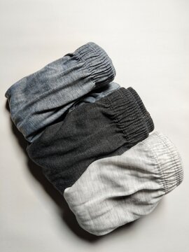 Neatly folded underwear organized in a clean arrangement, symbolizing personal care, clothing organization, fabric quality, household routine, and modern lifestyle. Excellent for retail catalogs, e-co