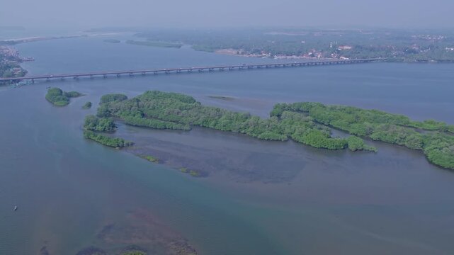 Aerial view of Sharavati coastal river near Honnavar surrounded by lush vegetated islandsAerial view of Sharavati coastal river near Honnavar surrounded by lush vegetated islands