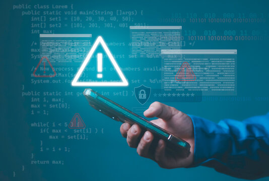 Cybersecurity warning, malware alert, coding interface and encrypted data, illustrating mobile security, cyberattack prevention and software vulnerability. Businessman holding smartphone