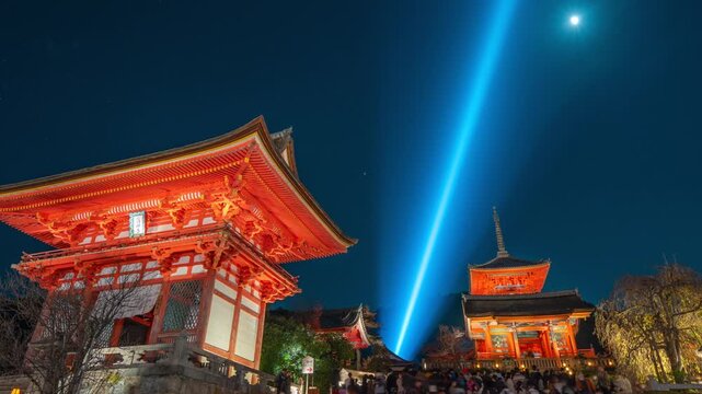 Timelapse view the iconic Kiyomizu-dera temple at night in Kyoto, Japan, zooming out. 