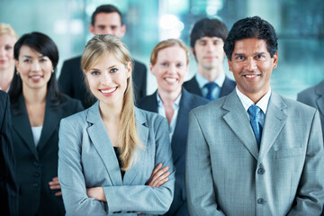 Fototapeta premium Portrait, happy and solidarity with business people in office for community, arms crossed or diversity. Synergy, support and partnership with employees in lobby for career, about us and mission