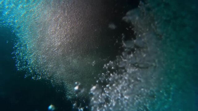 Close up of microplastics floating in water