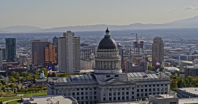 Salt Lake City Utah Aerial v7 drone fly around isolated state capitol building surrounded by beautiful downtown cityscape and mountainscapes in distance - Shot with Inspire 2, X7 camera - October 2021