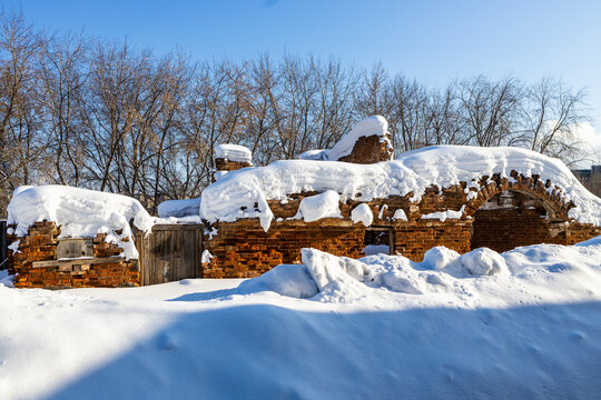 snowy ruined stable building in Nizhny Tagil