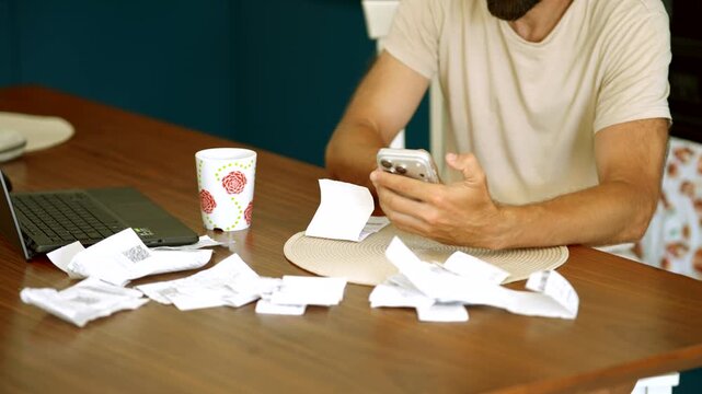 Person Сhecks Сhucks Expenses Paper Receipts Using Smartphone App. Accounting. Financial Audit 