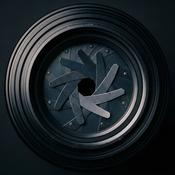 Close-up of camera aperture blades opening, revealing lens mechanics