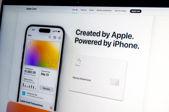 Apple card displayed on iphone and laptop screen showing website landing page