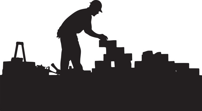 Silhouette of a bricklayer building a wall with bricks