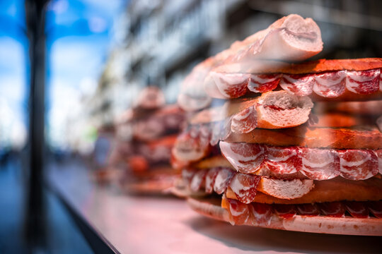 Traditional Spanish Bocadillo de Jamon Iberico with Olive Oil on Crusty Baguette Bread for Tapas Menu