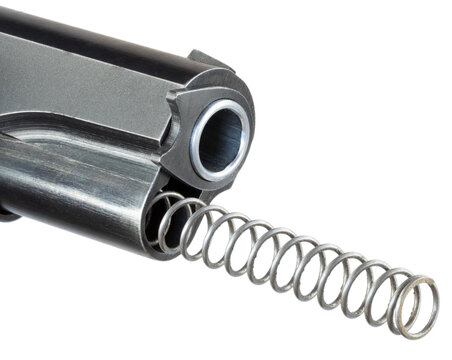 1911 semi-auto pistol recoil spring being released