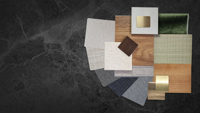 Interior design material samples mood board on dark marble background, flat lay combination of wood veneer tiles brass metal plates and textile fabric swatches, creative architecture project collage.