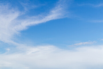 Fototapeta premium Sky replacement blue skies with white wispy serene clouds floating overhead
