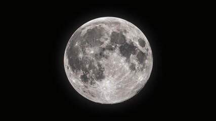 Naklejka premium A close-up view of the full moon glowing brightly in the dark night sky with craters and texture visible