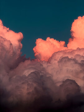 Dreamy sunset sky with massive clouds