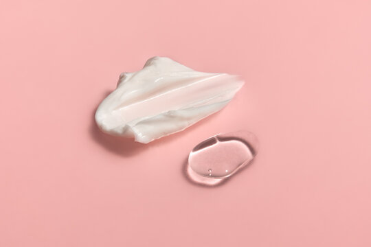 Cream and Face Serum Drop on Pink Background in a Bright Light