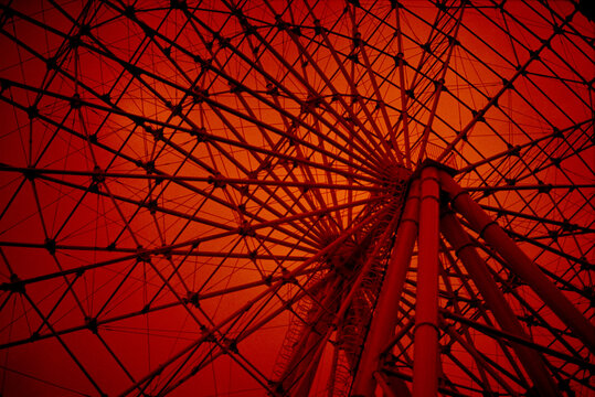 Reddish Background Ferris Wheel