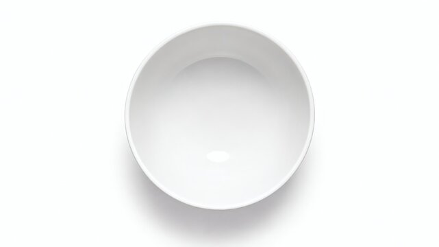 A pristine white ceramic bowl on a plain white background, simple and elegant tableware