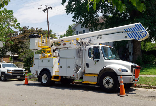 Utility truck parked on residential street