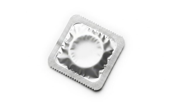 A single silver foil condom package for safe sex protection and family planning healthcare object