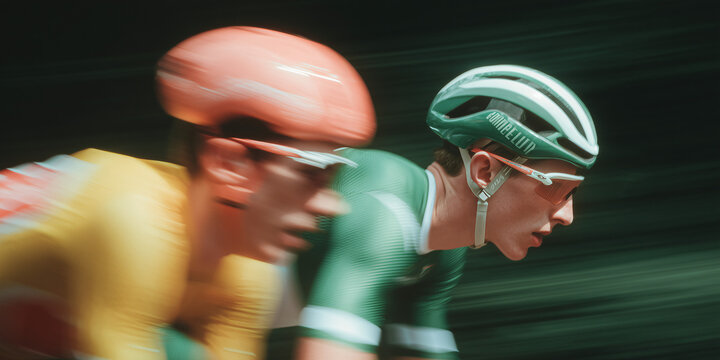 Two cyclists race neck and neck, their determined faces focused on the finish line. The motion blur emphasizes their speed and the intensity of the competition