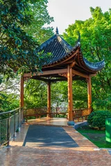 A Chinese-style gazebo in a park in China © alexmu