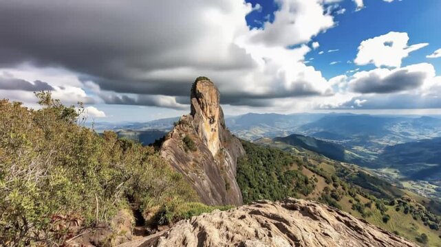 Pedra do Ba&uacute; in S&atilde;o Bento do Sapuca&iacute; in aerial view. Rock climbing site. Atlantic Forrest. Time lapse.