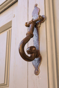 Vintage wooden door with wrought iron details