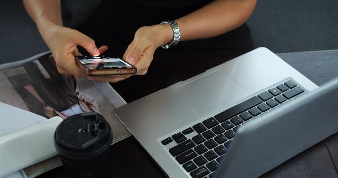 Person thoughtfully evaluates image quality and composition on electronic screen. Individual carefully inspects and chooses best photographs from digital collection with concentration