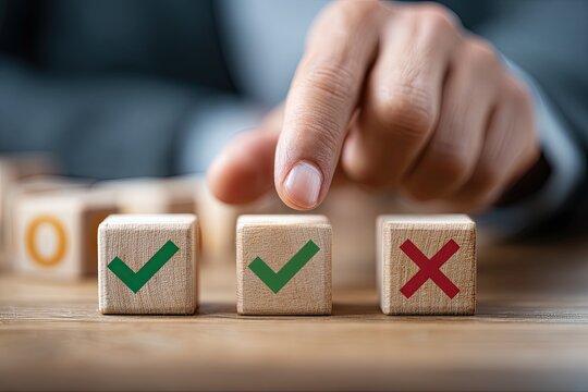 A hand selects a checkmark, alongside another, with a failing mark displayed on a wooden block