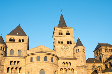 Obraz premium High Cathedral of Saint Peter in Trier, Moselle Valley Germany, roman catholic dom, brickwork tower facade 