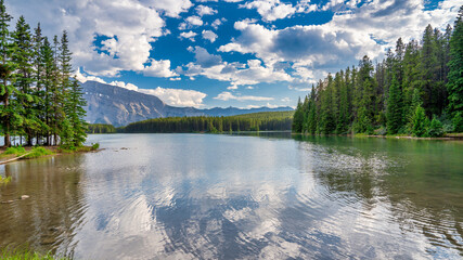 Nature's Palette - Vibrant Sunset Skies Above Johnson Lake in the Canadian Rockies