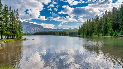 Nature's Palette - Vibrant Sunset Skies Above Johnson Lake in the Canadian Rockies © jovannig