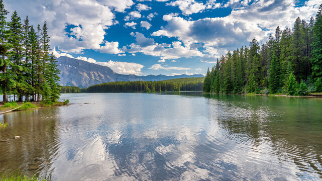 Nature's Palette - Vibrant Sunset Skies Above Johnson Lake in the Canadian Rockies