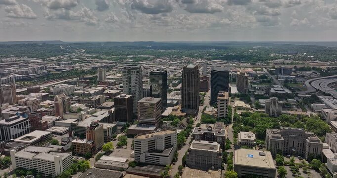 Birmingham Alabama Aerial v22 fly around capturing cityscape of central city and jefferson convention complex with interstate highway passing through downtown area - Shot with Mavic 3 Cine - May 2022