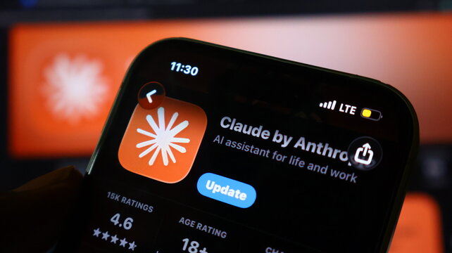 Smartphone screen displaying Claude app update on mobile device