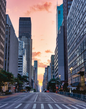 New York City Avenue at Sunrise Between Manhattan Skyscrapers