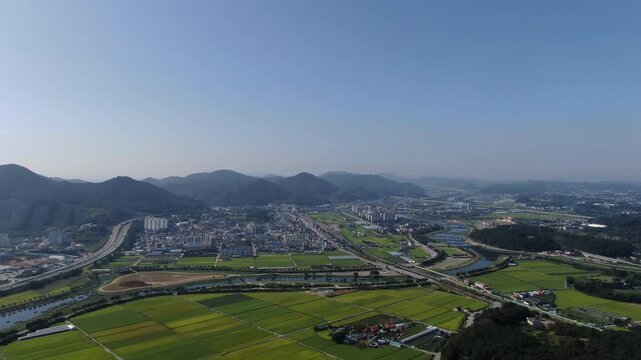 South Korea Jangseong drone aerial view, rural agricultural rice fields, country highway infrastructure travel landscape / 한국 전남 장성군 드론 항공 촬영 전경, 농촌 풍경 시골 고속도로 분기점 교통 인프라 아시아 관광 여행 영상