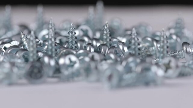 Metal mounting screws close-up. Macro image.