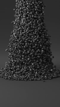 Black polypropylene plastic granules pouring into a glass cup, industrial masterbatch resin pellets, 3D render dynamic Vertical video.