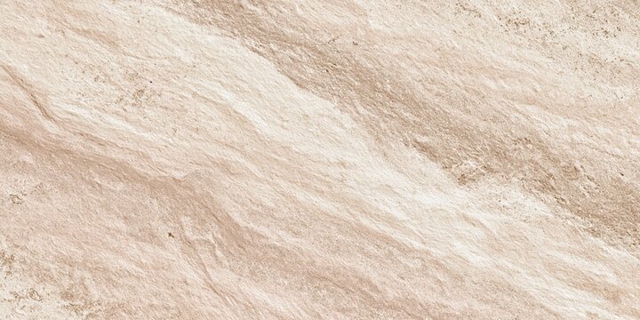 Close-up beige textured stone wall surface for background